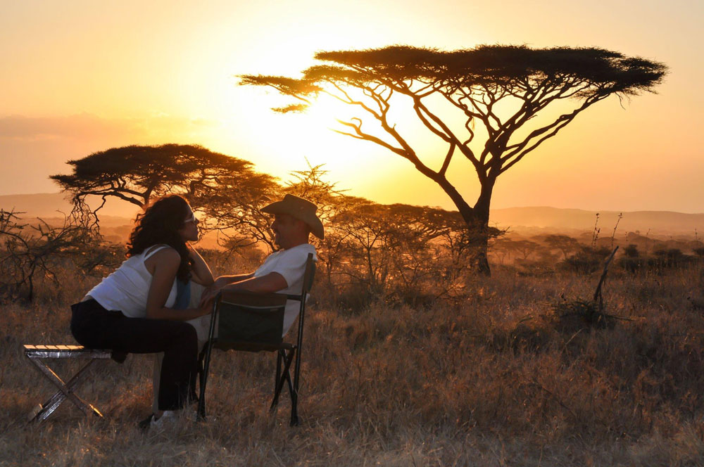 Couple enjoying a romantic Tanzania honeymoon safari